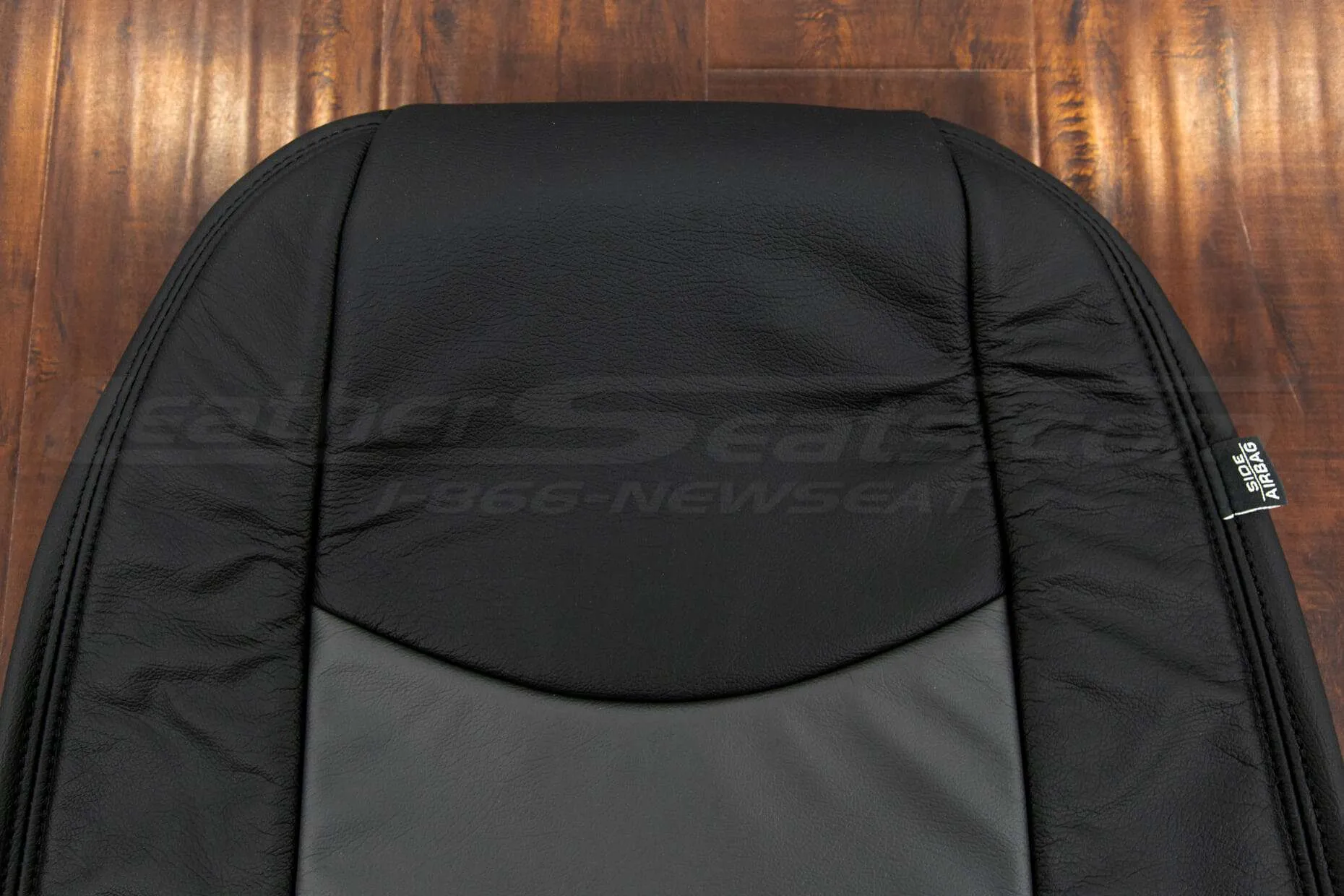 Chevrolet Spark upholstery - kit black & charcoal - Top of backrest close-up