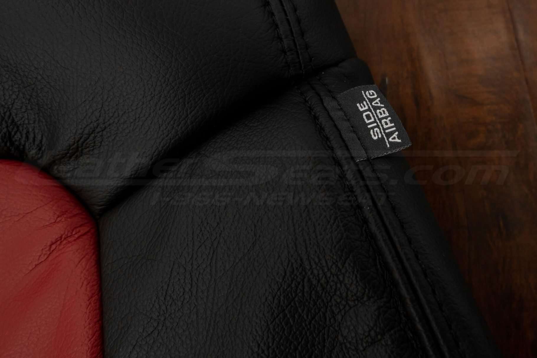 Pontiac G8 Leather Kit - Black & Red - Side double-stitching with airbag tag