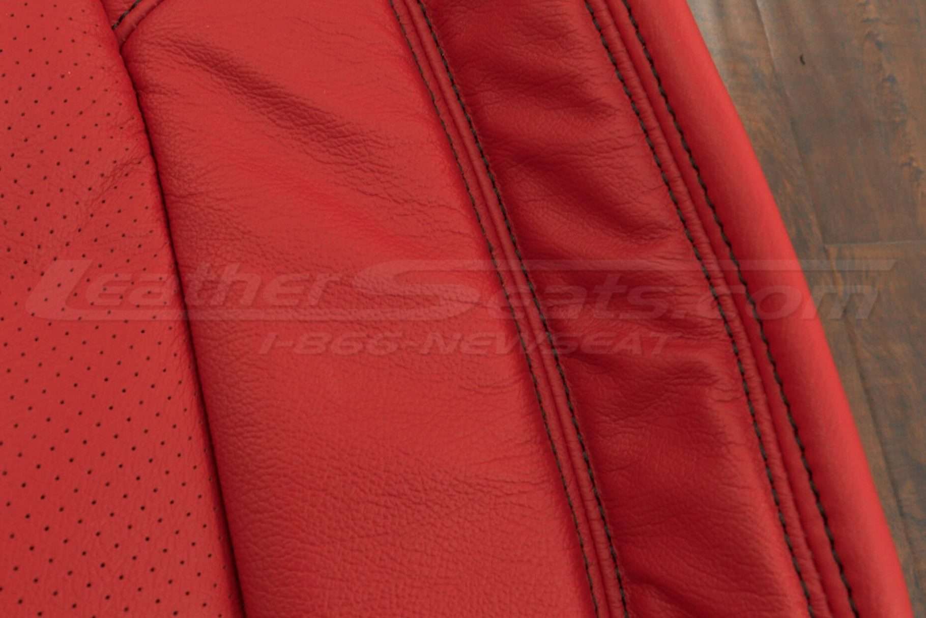 Black double-stitching and perforated combo