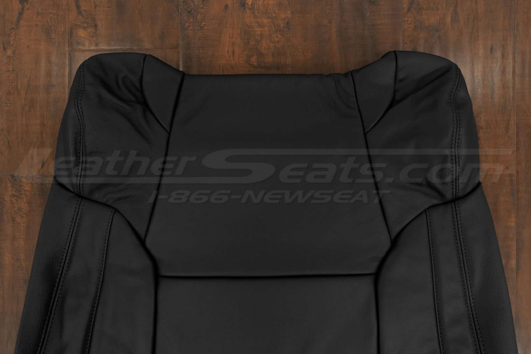 Upper section of front seat backrest