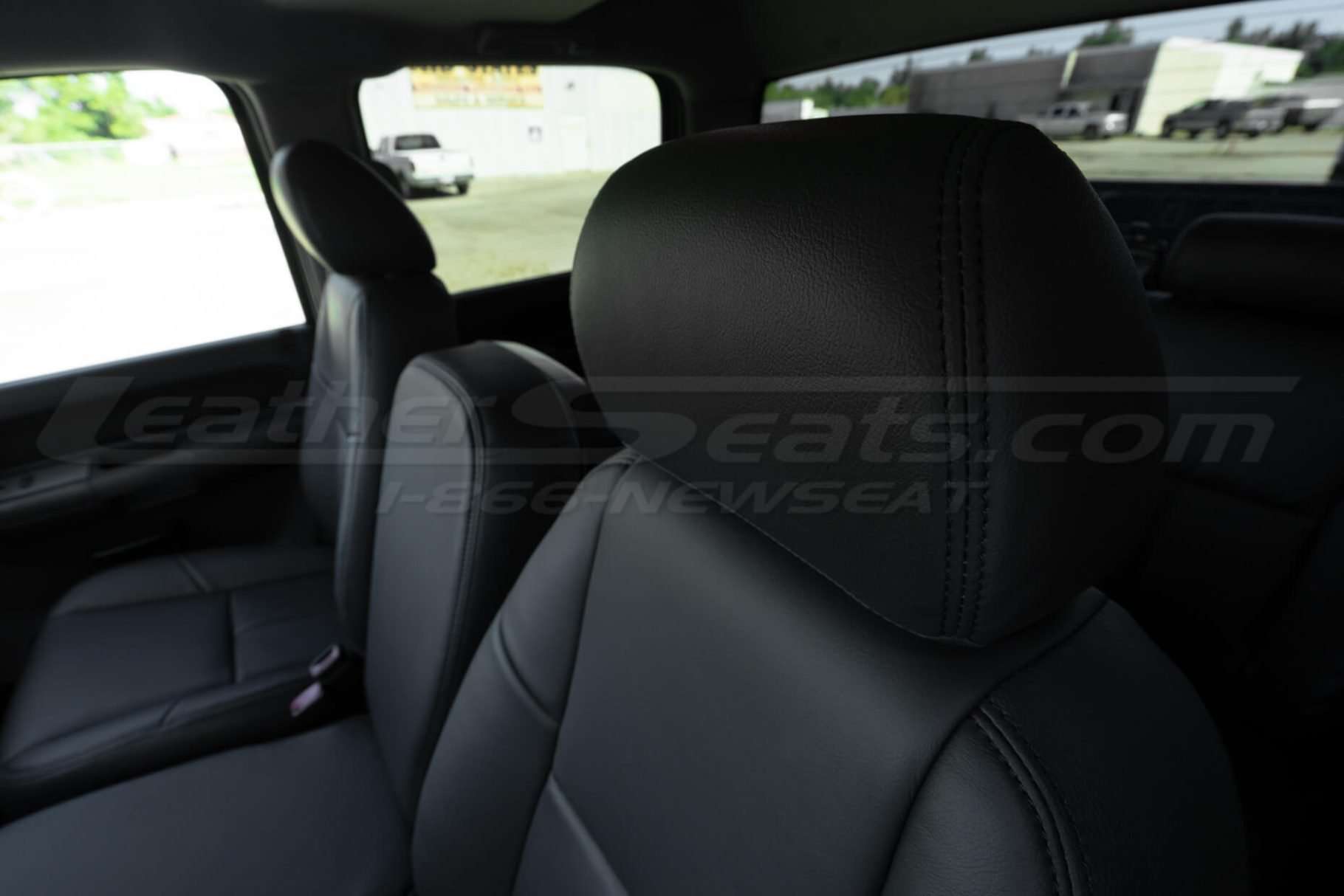 Installed Dark Graphite headrest with matching stitching