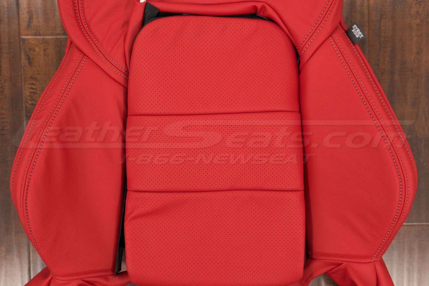 Perforated backrest insert