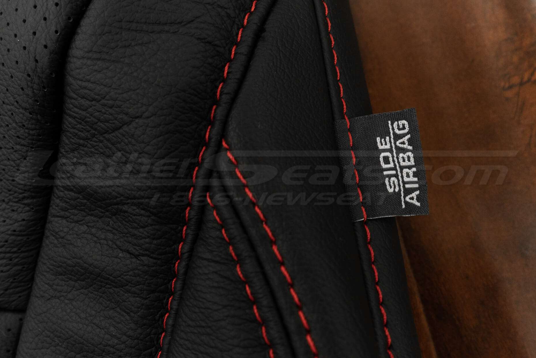 Side airbag tag with Bright red stitching