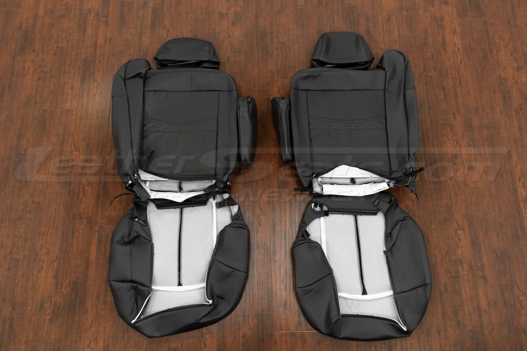 Back view of front seats and arm rests