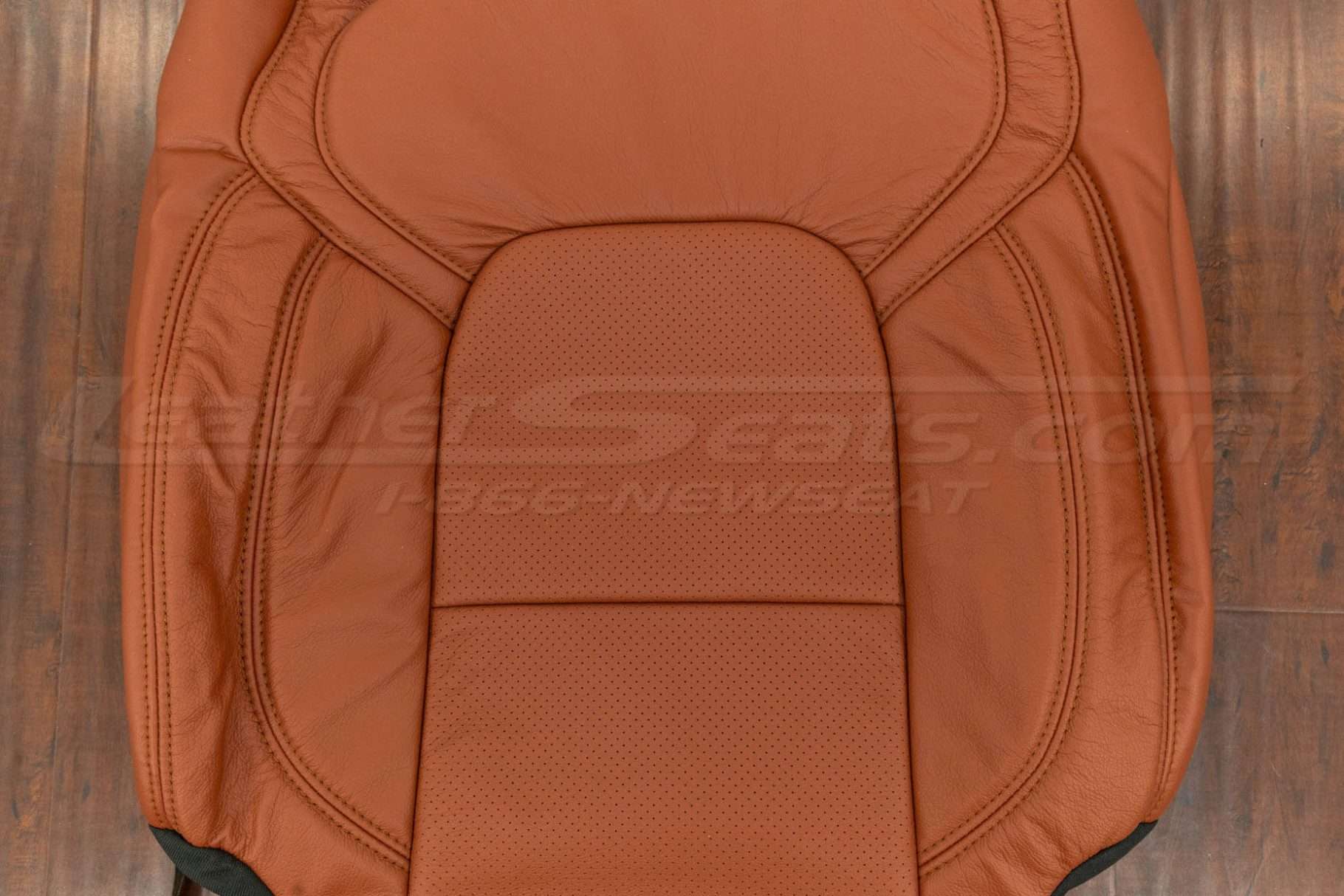 Perforated combo backrest upholstery