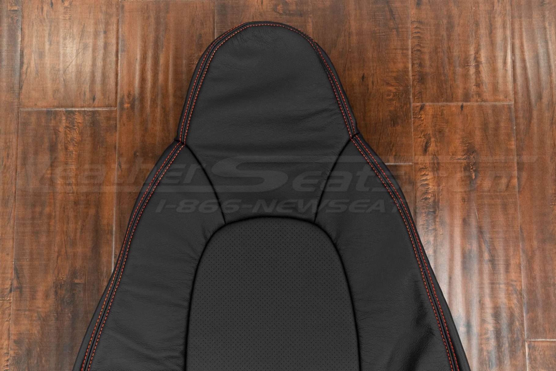 Uppersection of backrest with headrest