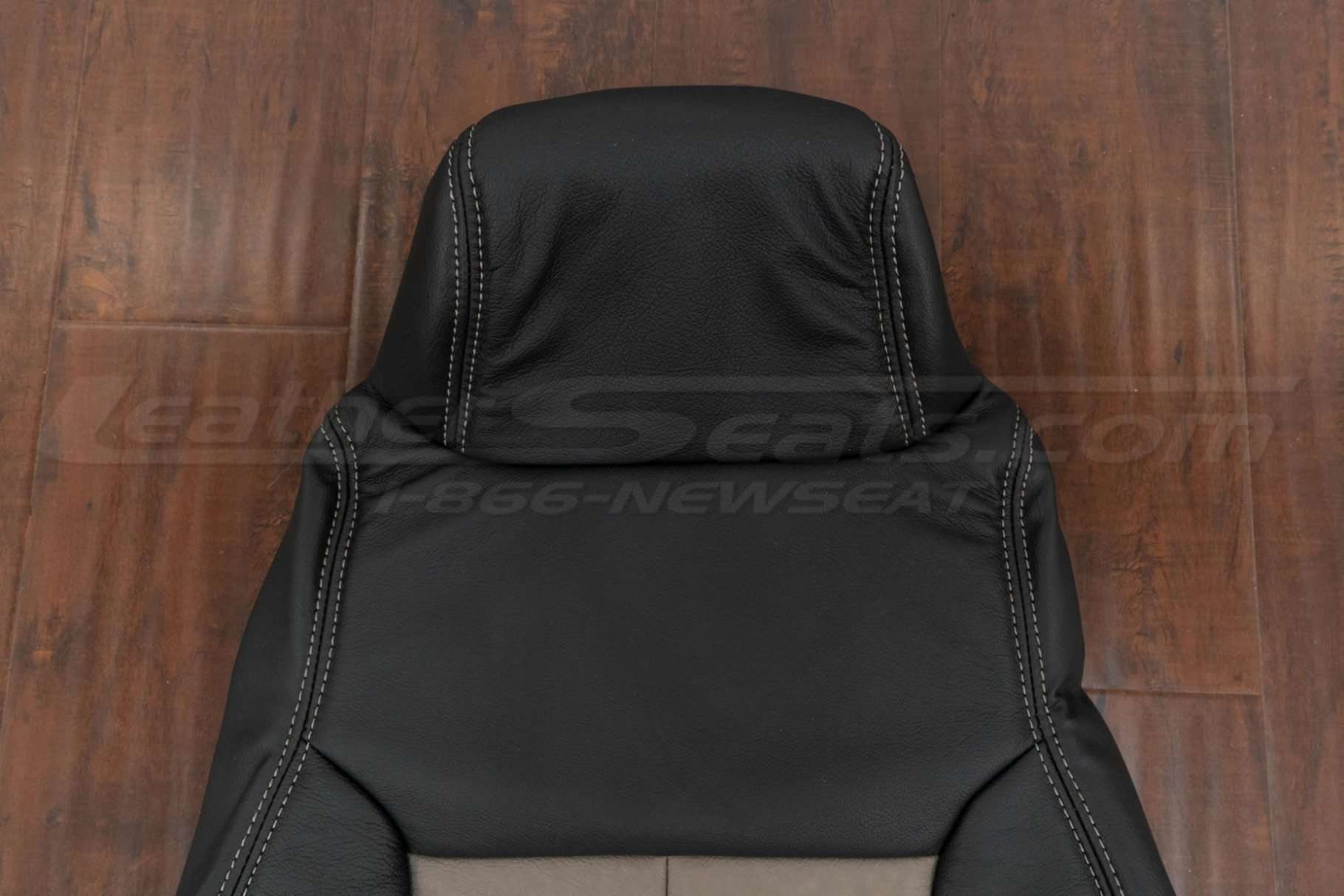 Upper section of backrest with attached headrest