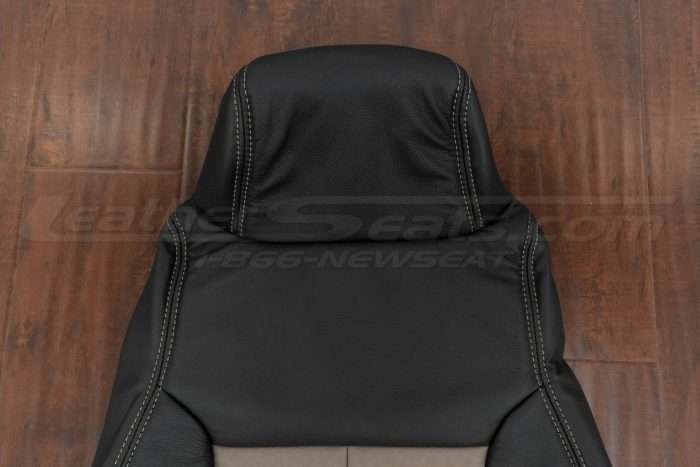 Upper section of backrest with attached headrest