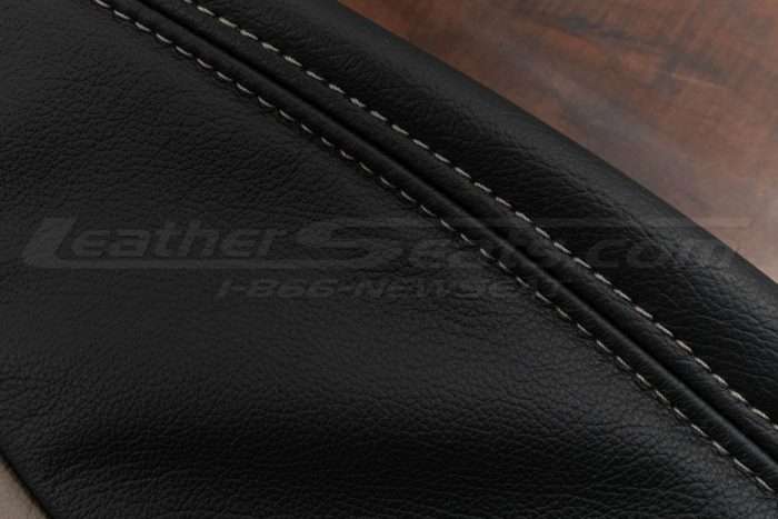 Contrasting slate stitching on black leather