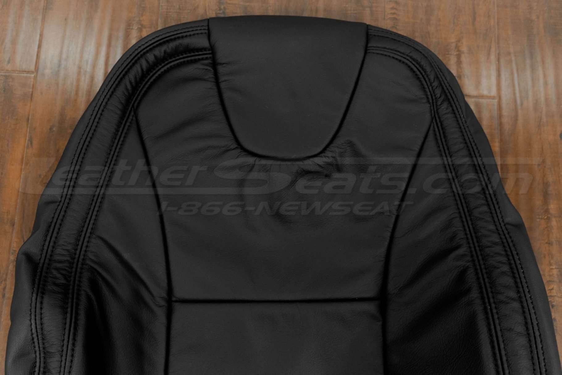 Upper section of front backrest upholstery