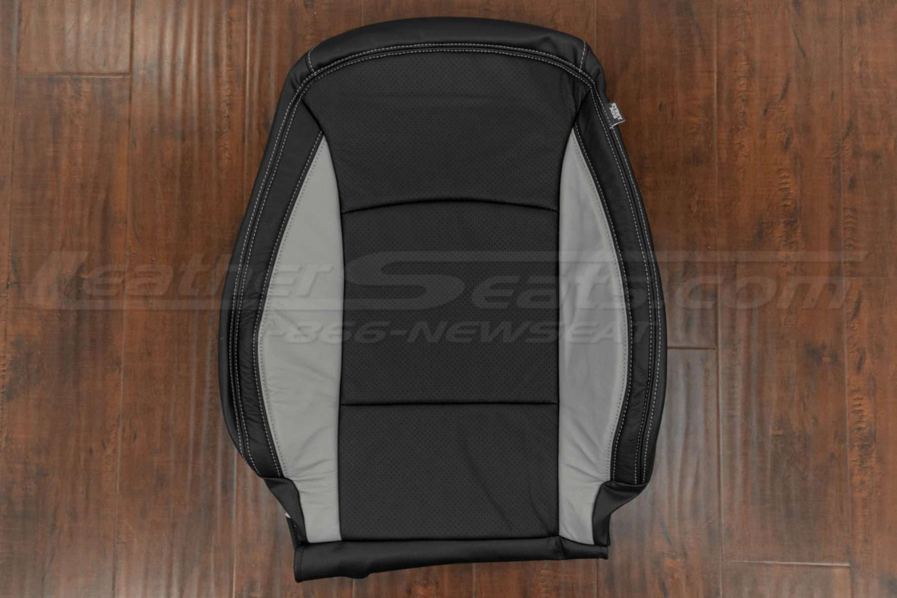 Front backrest upholstery with perforated body