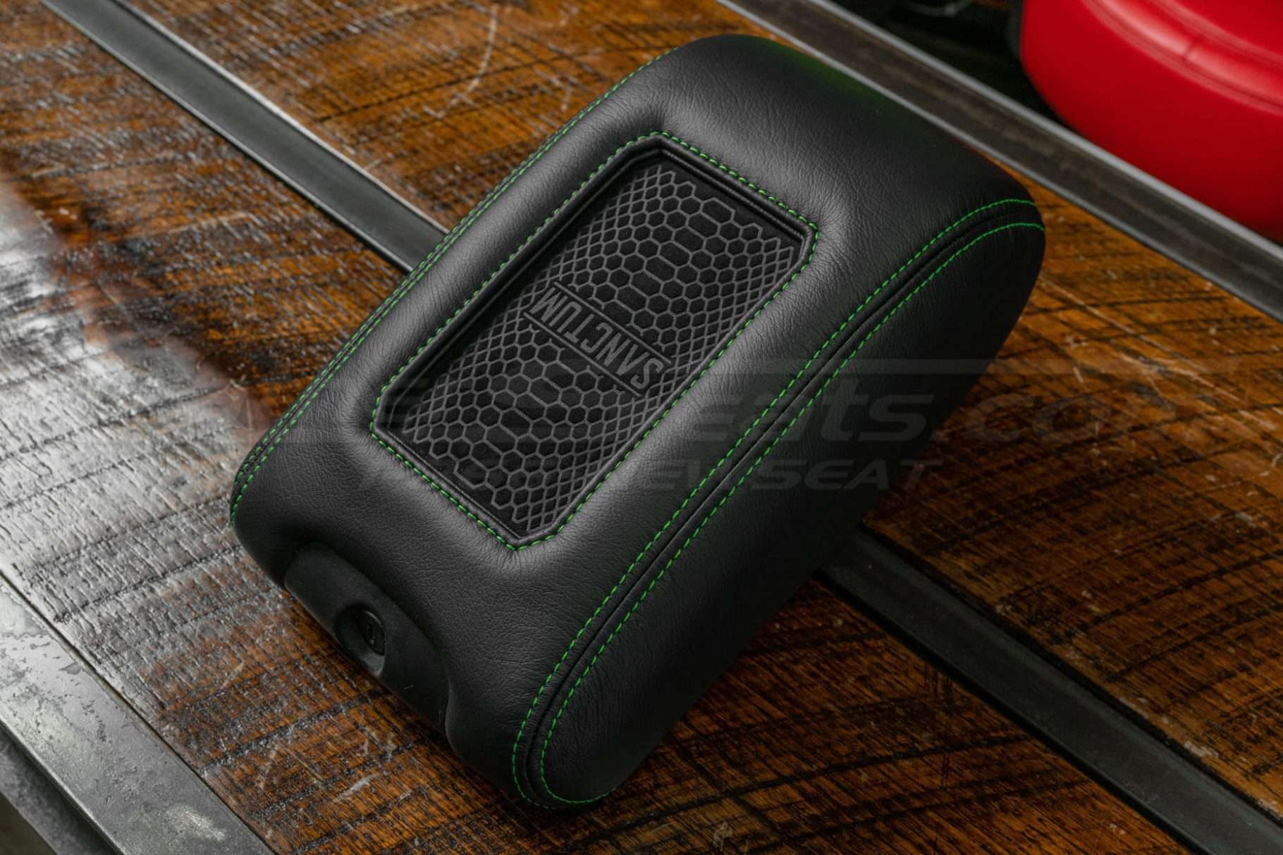 Side view of Sanctum Charging Console with Lime Green stitching