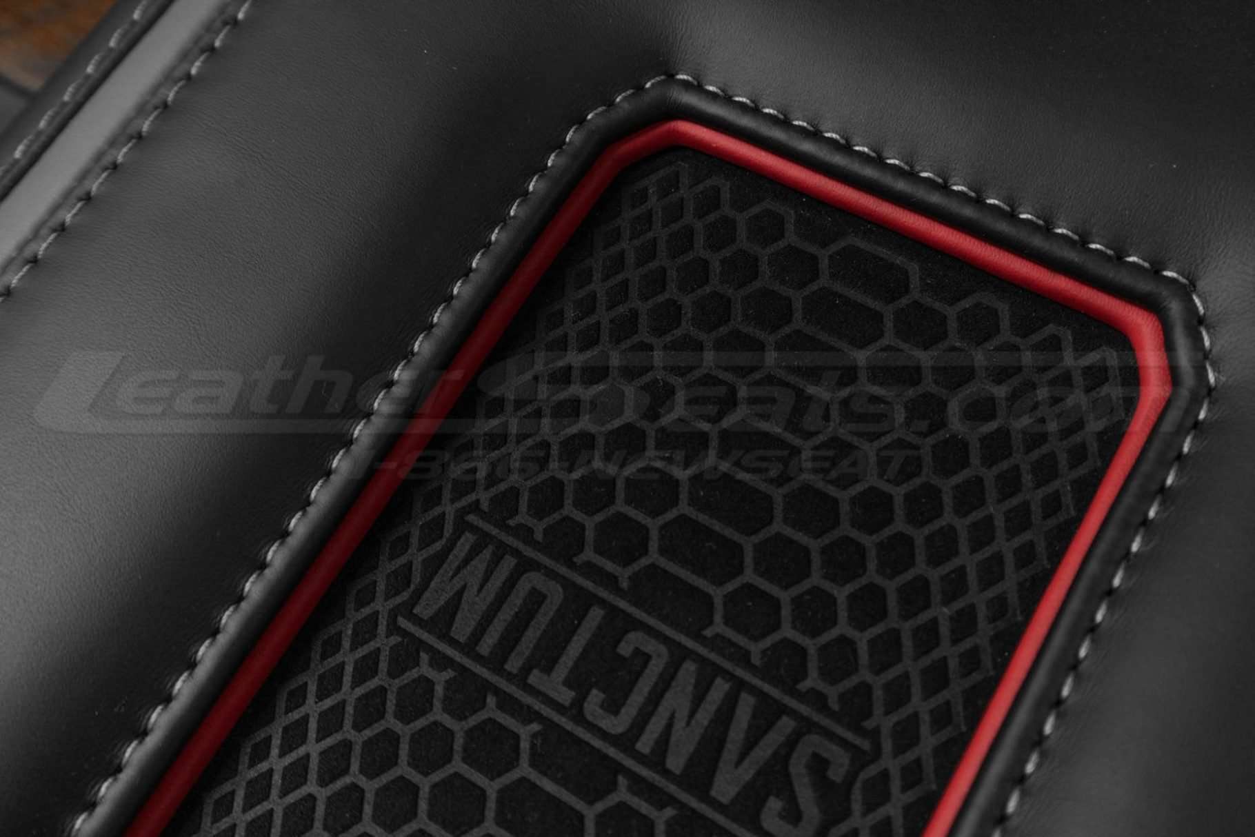 Red trim with silver stitching