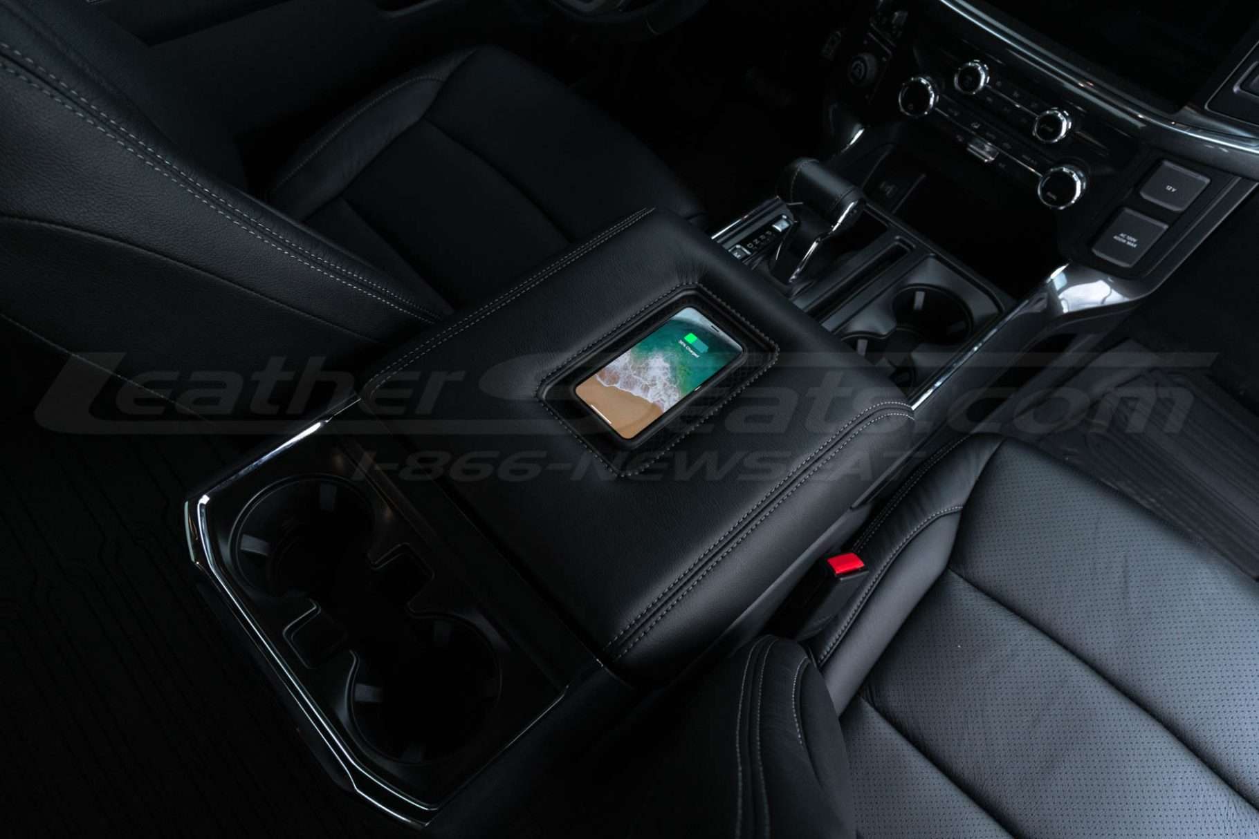 Sanctum Wireless Charging Console - Charging phone