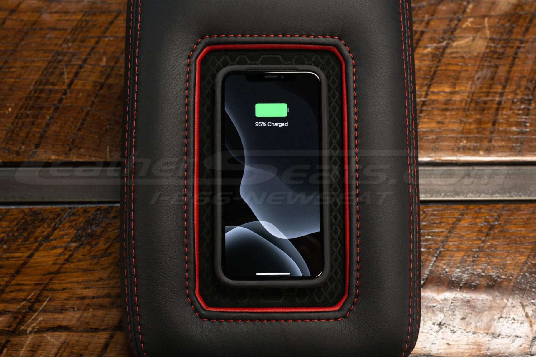 Sanctum Wireless Charging Console - Charging phone