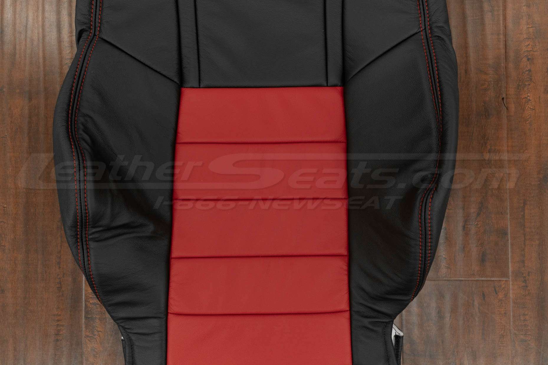 Red insert section of front backrest upholstery