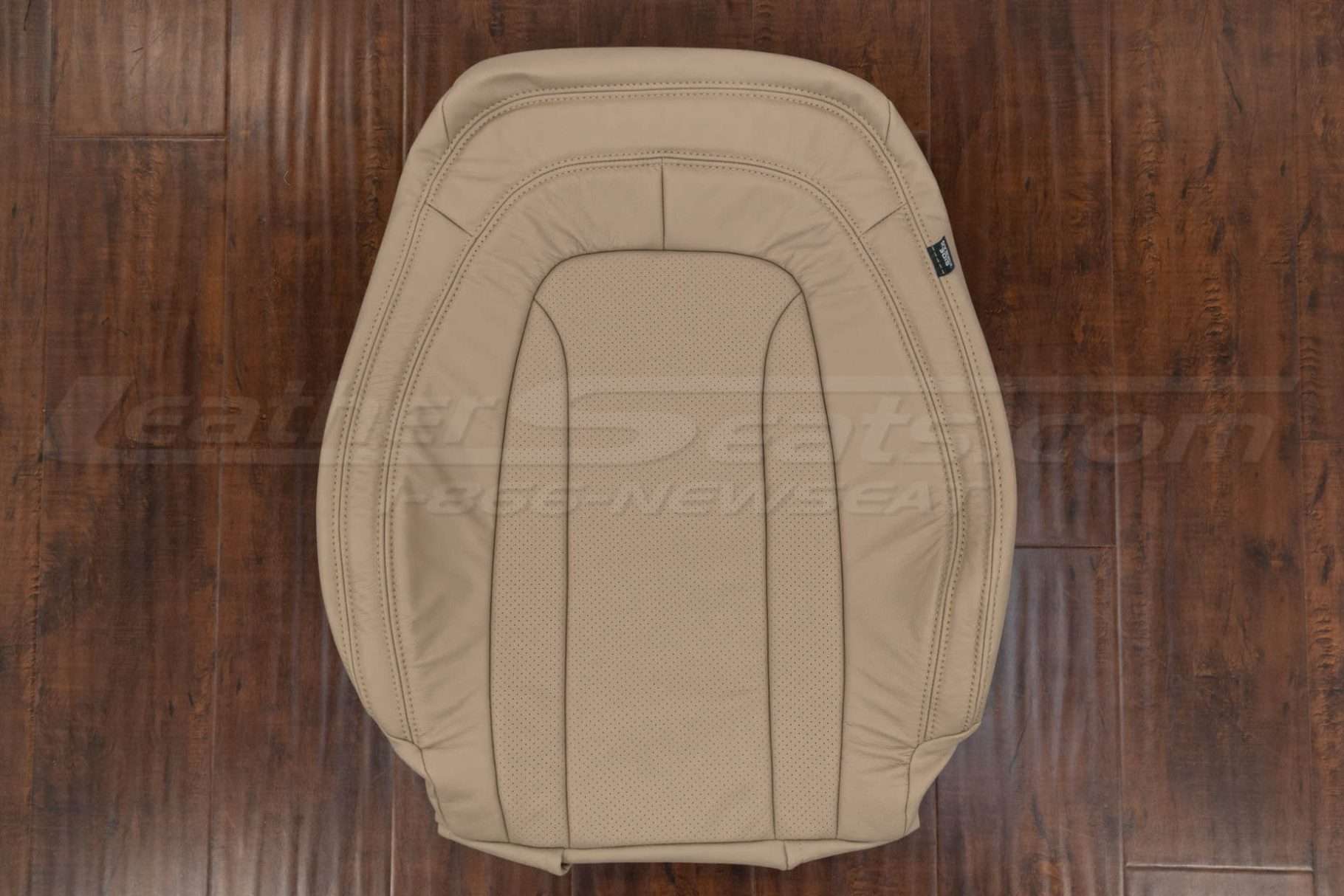 Perforated insert backrest upholstery