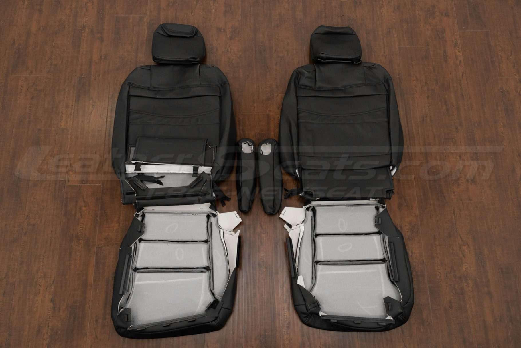 Back view of front seat upholstery and armrests