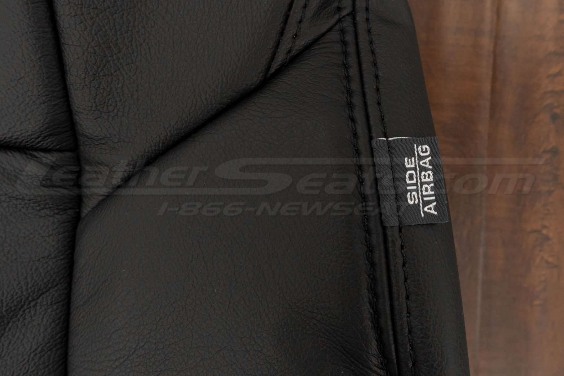 Side airbag tag on front backrest