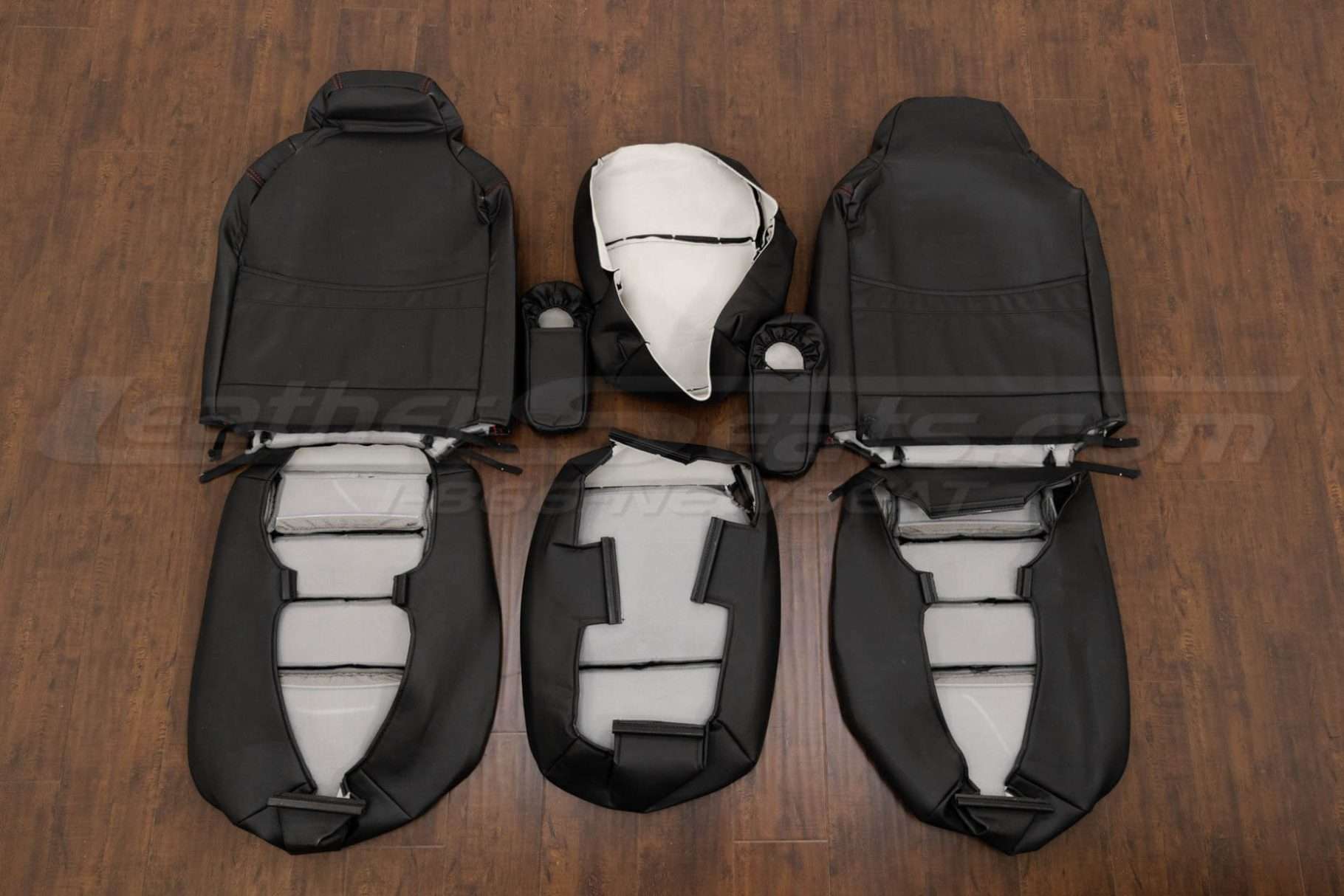 Back view of front seat upholstery and armrests