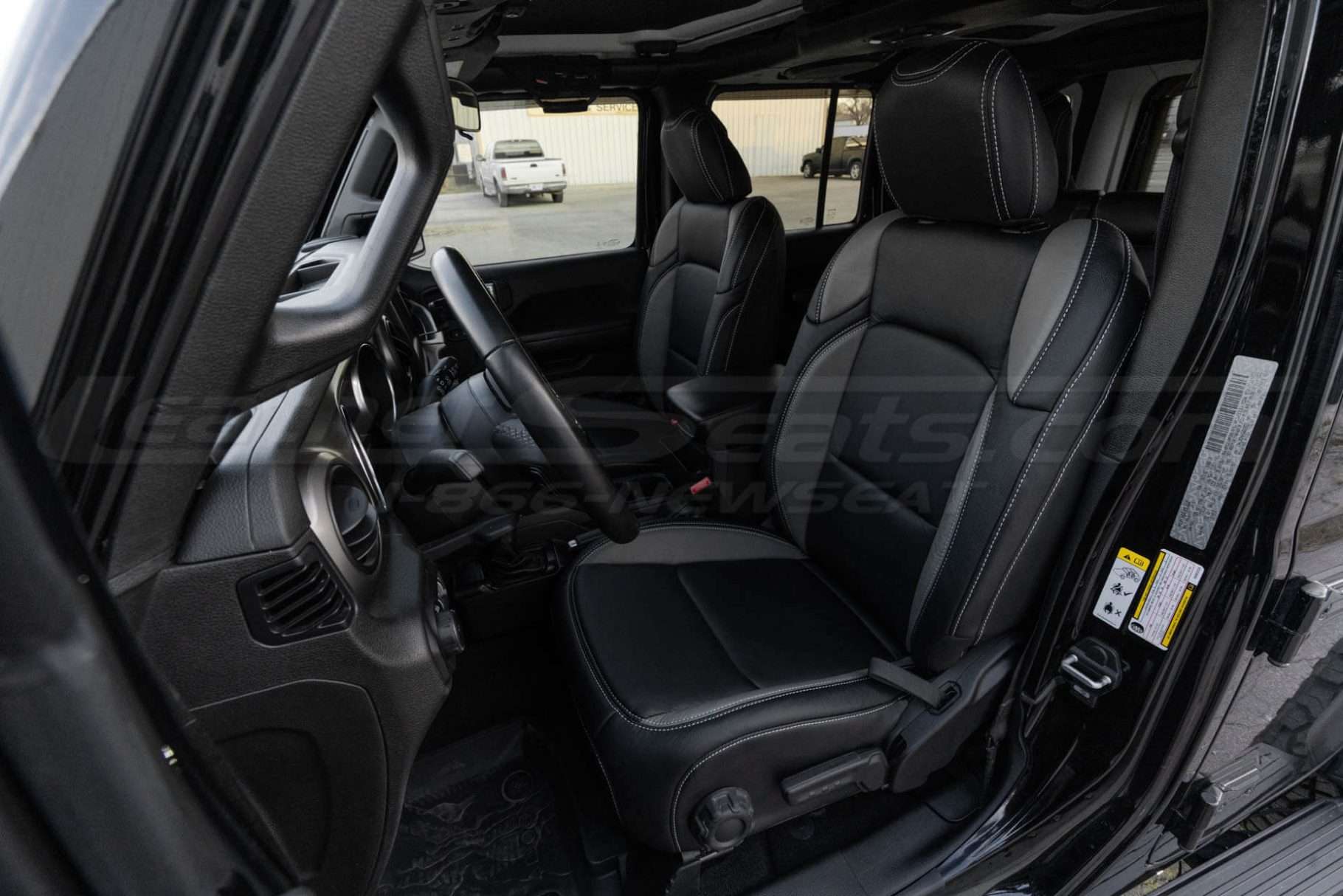 Jeep Wrangler JL Installed Leather Seats - Black with Grey Wings - Front seat hero shot