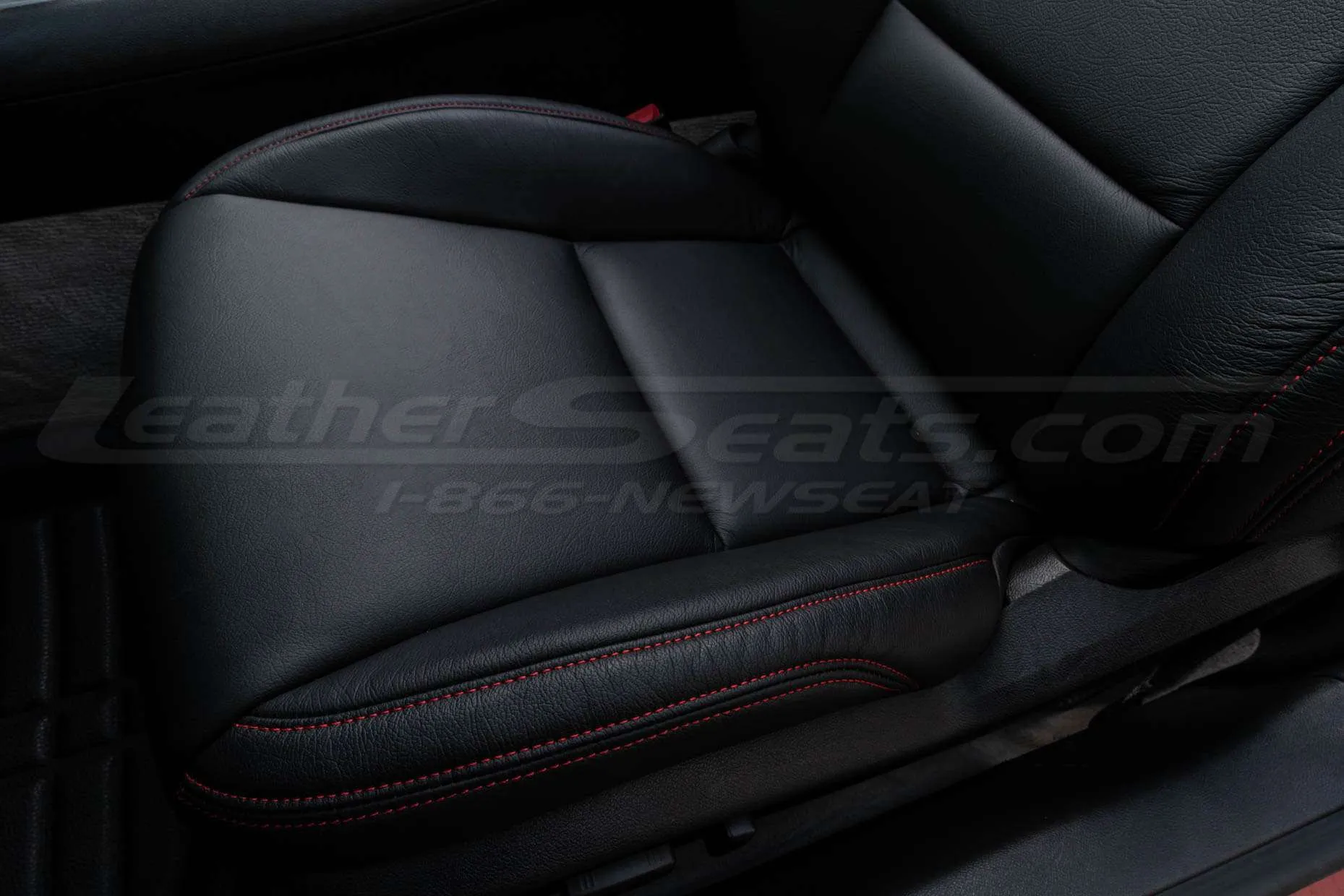 Leather seat cushion with Cardinal stitching