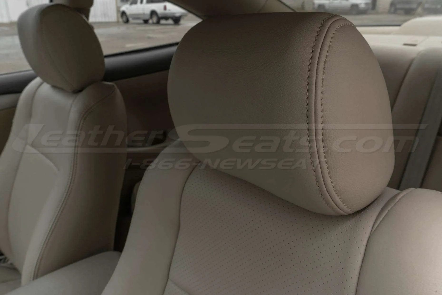 04-09 Toyota Solara Installed Leather Seats - Ivory - Front driver's headrest with matching stitching