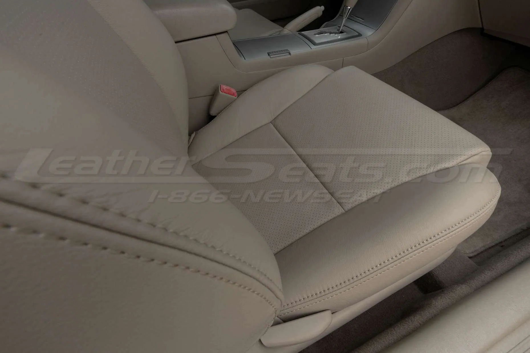 Matching double-stitching and perforated passenger cushion