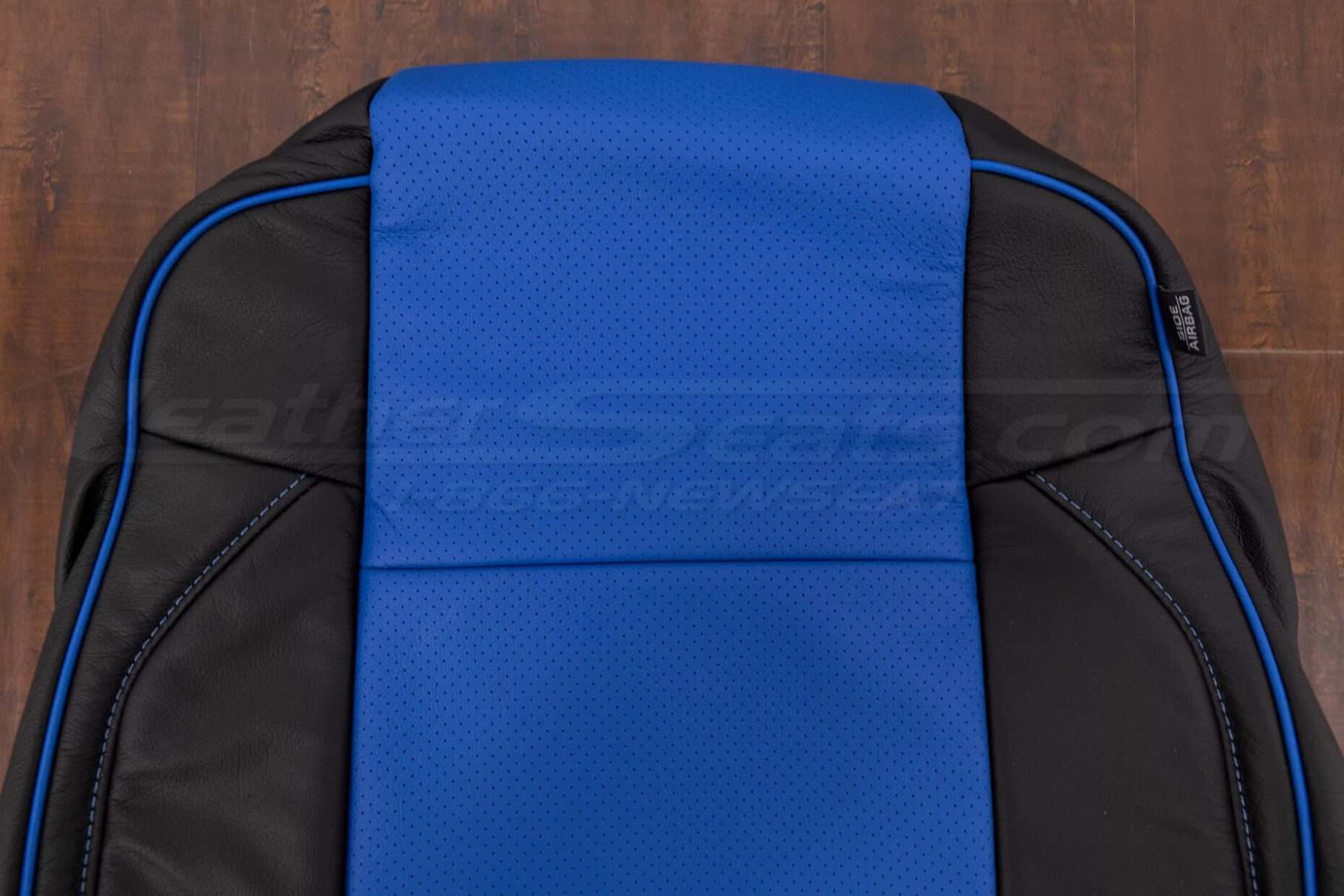 Upper section of front backrest upholstery