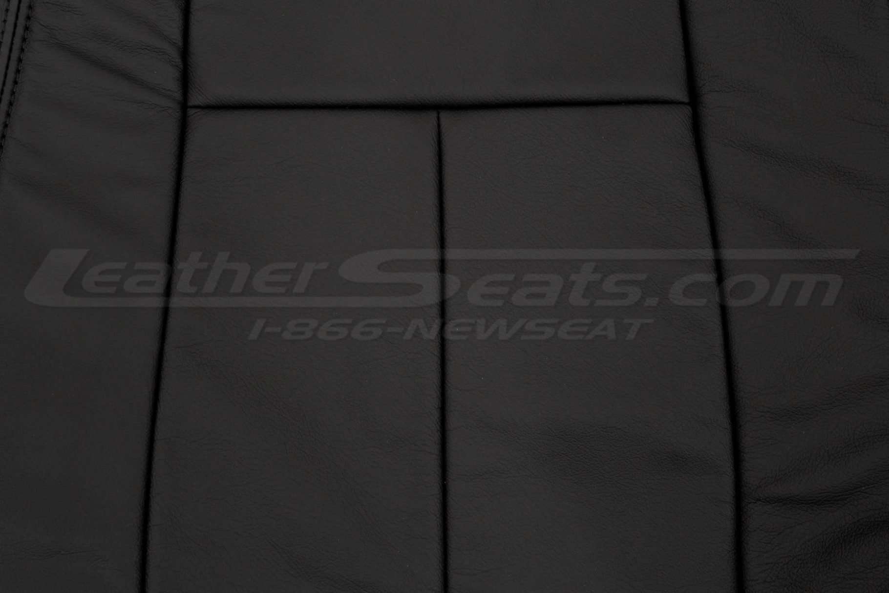 Black insert section of backrest upholstery