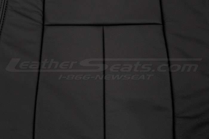 Black insert section of backrest upholstery