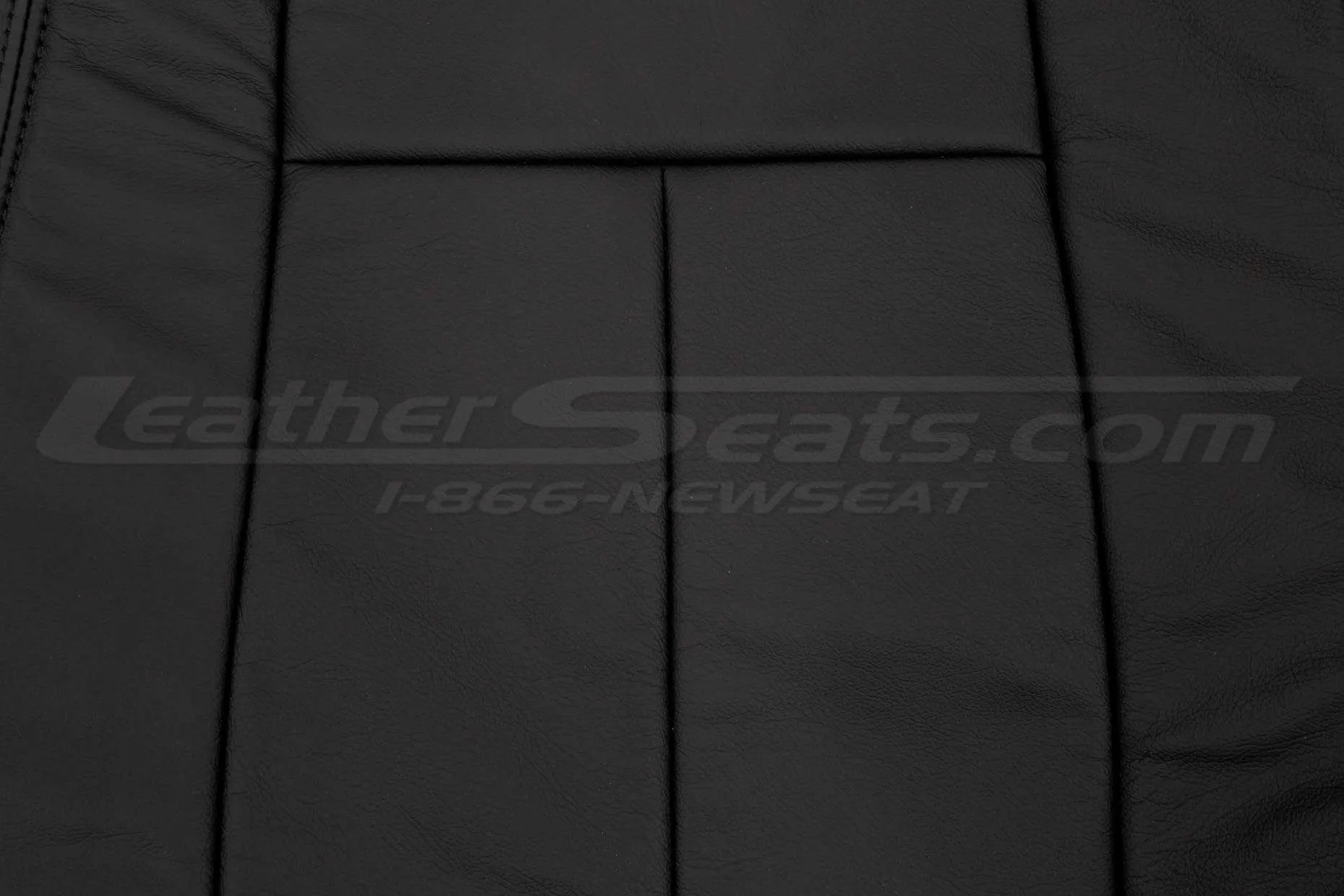 Black insert section of backrest upholstery