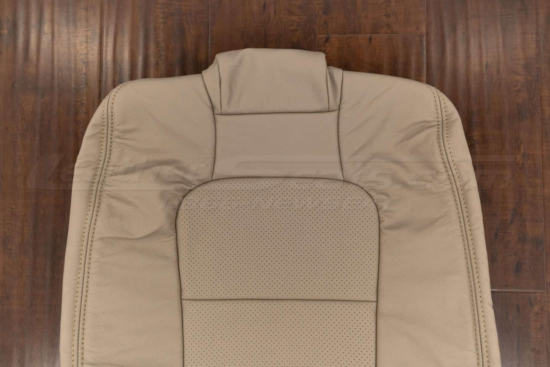 Upper section of front backrest upholstery