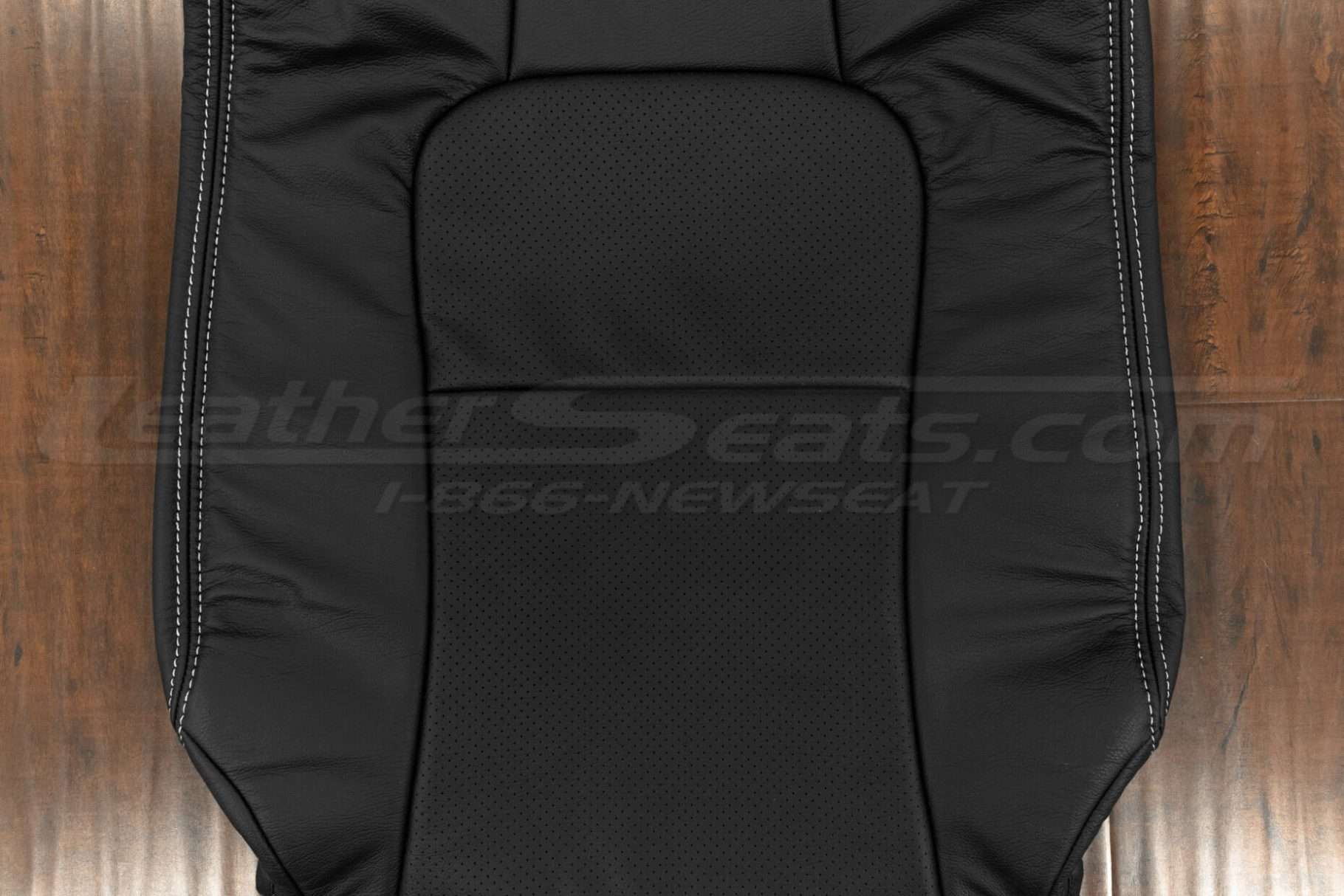 Perforated Insert of front backrest upholstery