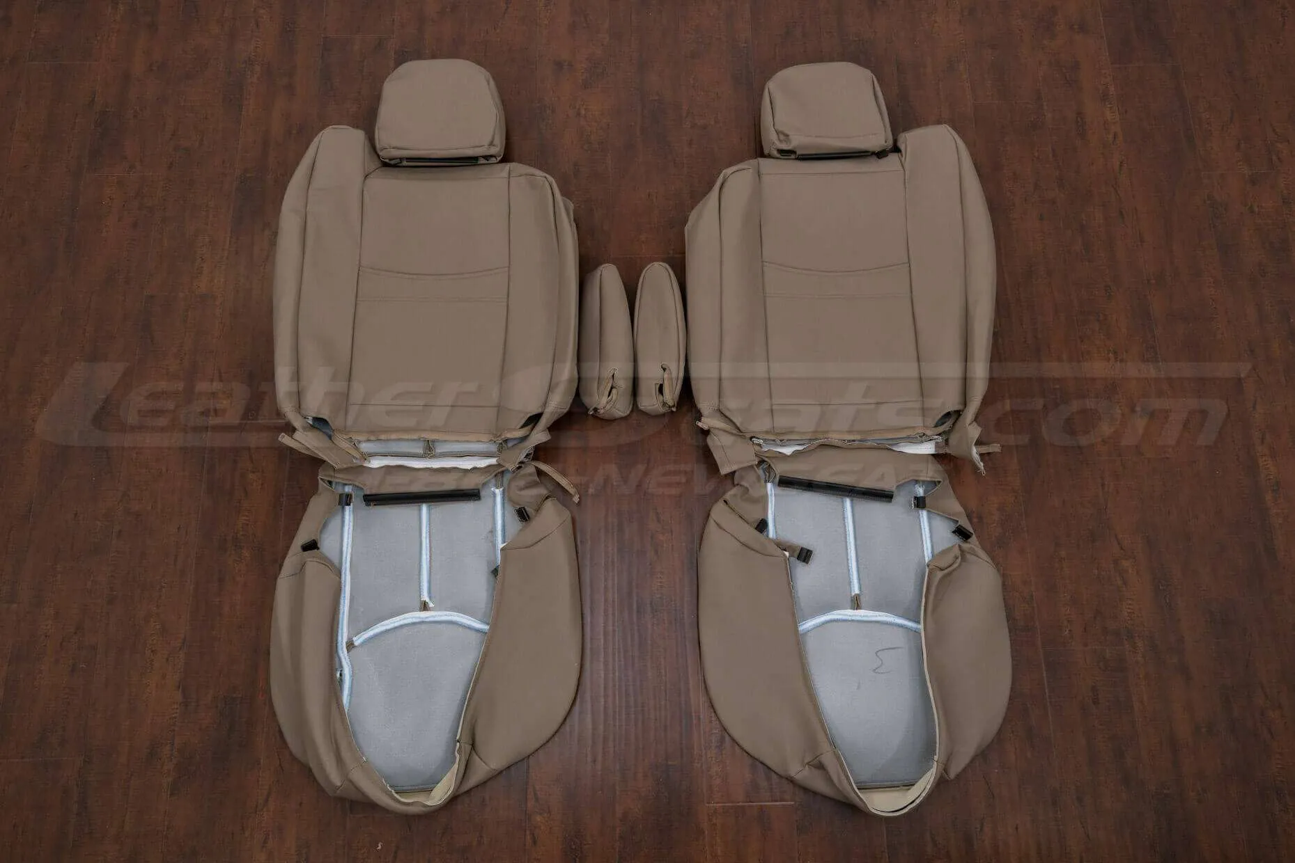 Back view of front seat upholstery with armrests
