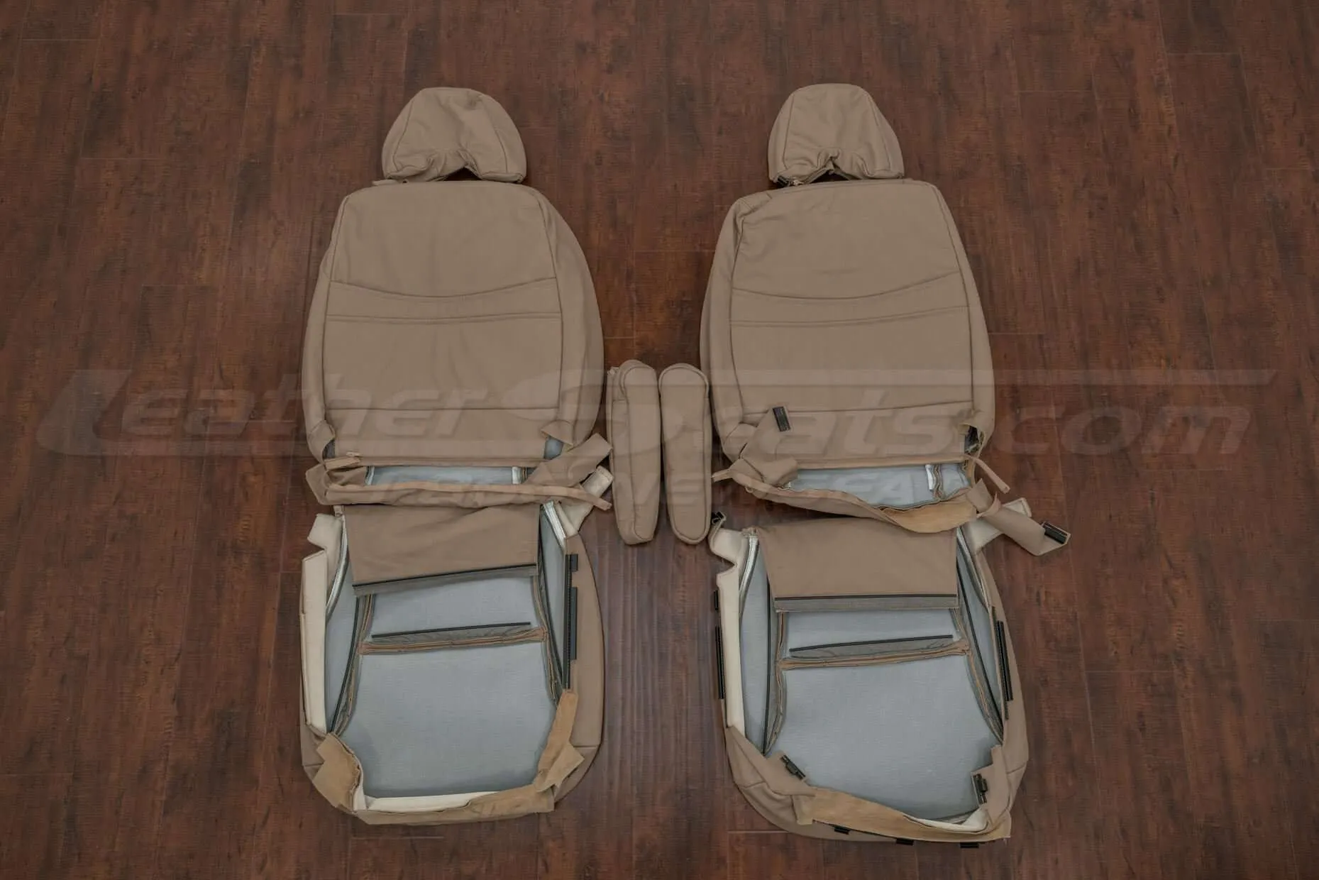 Back view of front seat upholstery and armrests