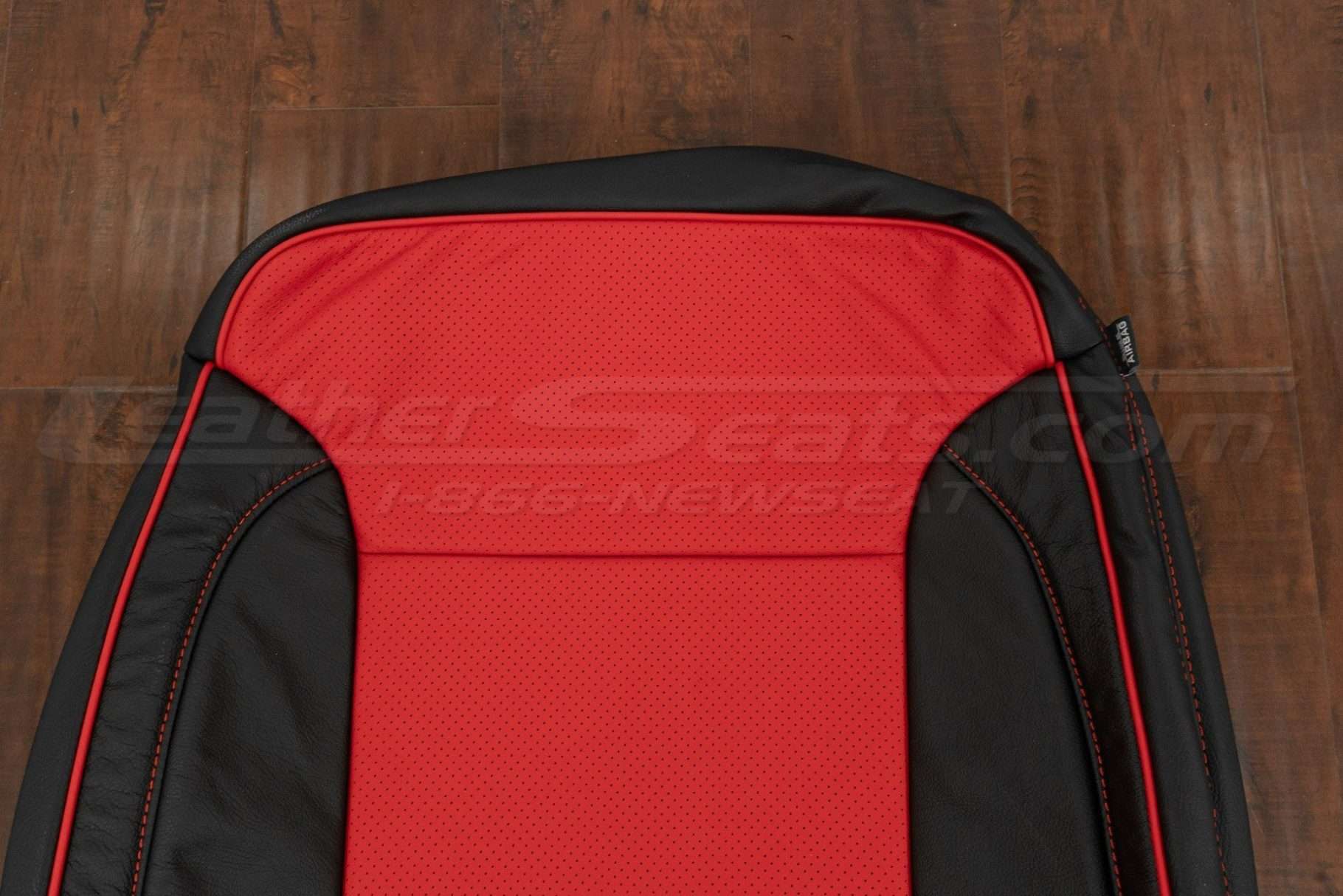 Upper section of front backrest upholstery