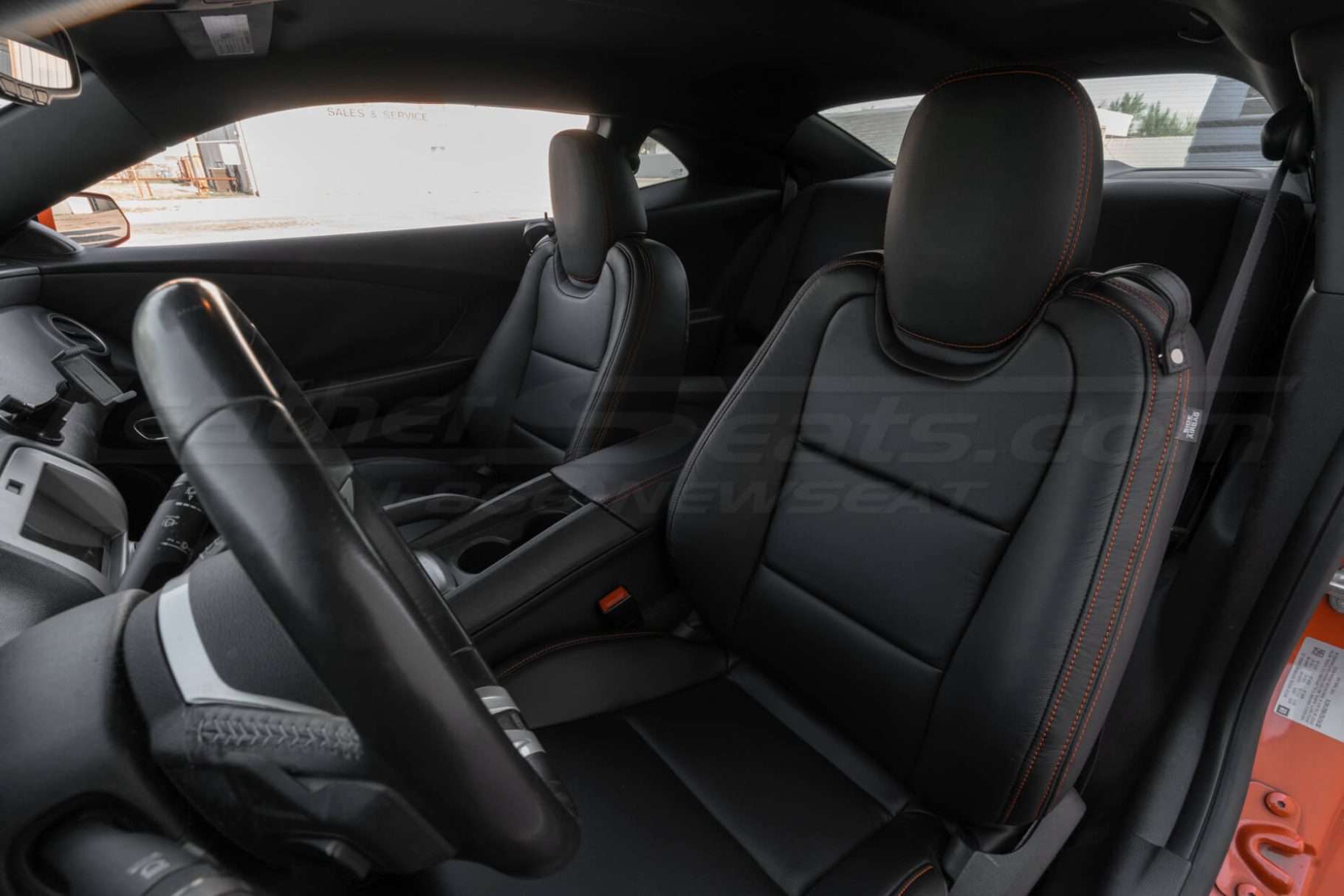 Mid section up of front drivers seat