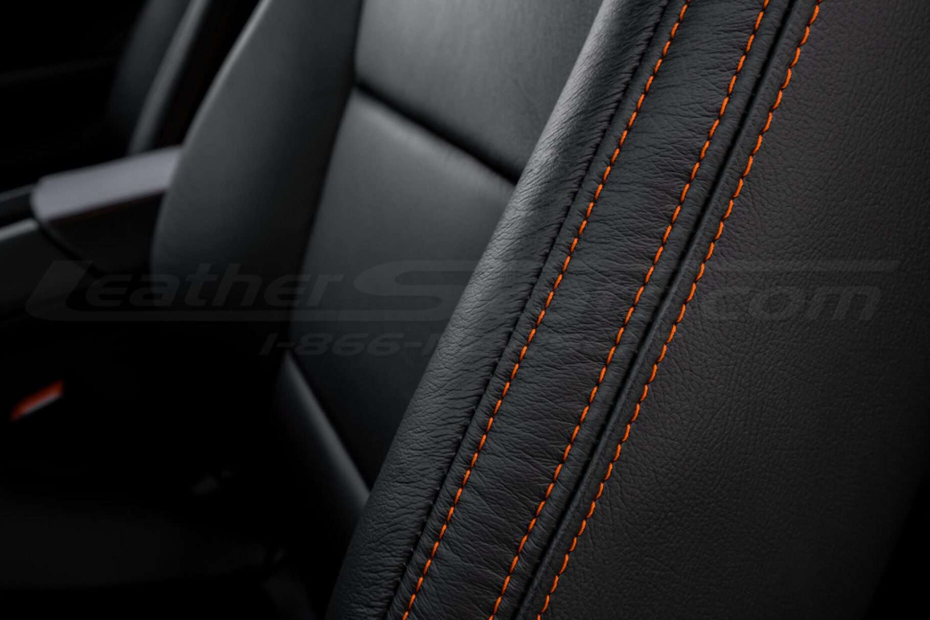 Contrasting Tangerine stitching