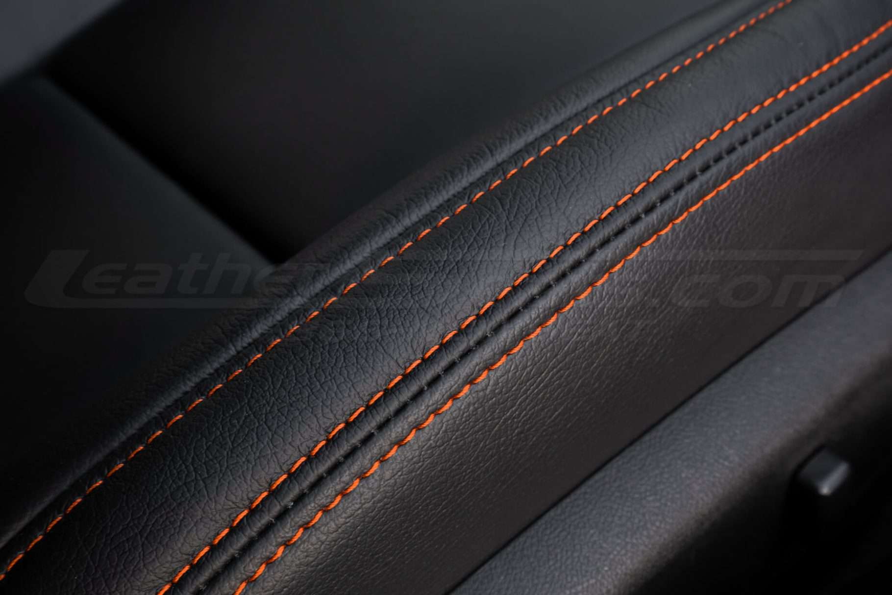 Contrasting stitching in Tangerine