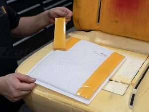 Removing the adhesive strip backing