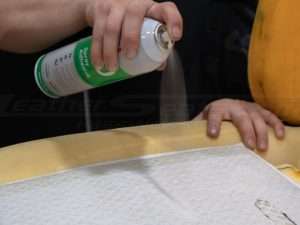 Adding adhesive spray to the Carbon fiber pad