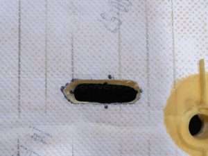 Foam completely removed from traced hole