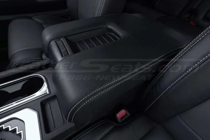 Black console lid cover with silver stitching
