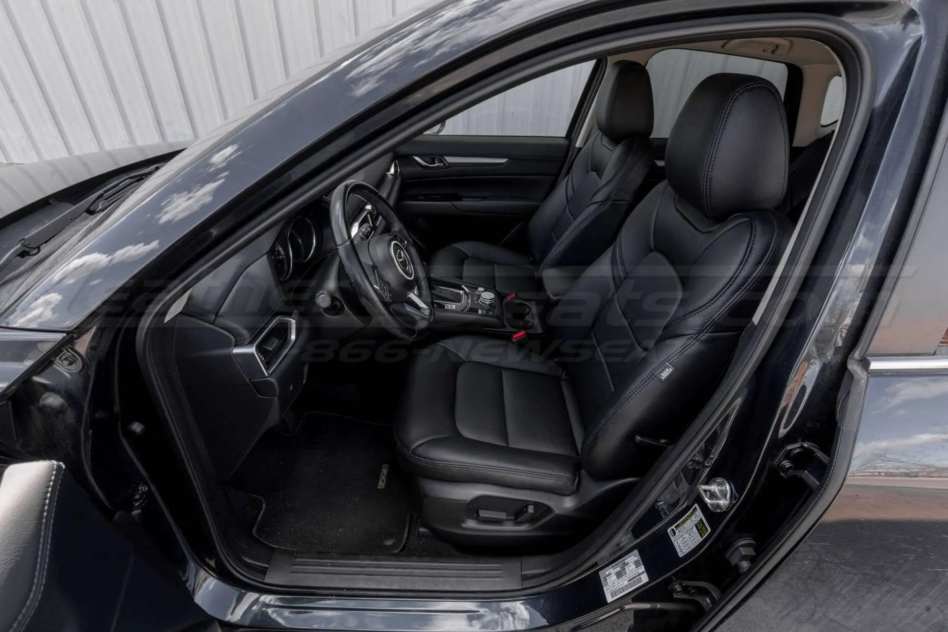 Mazda CX5 Touring Installed Leather Seats - Black - Front driver's seat alternative angle