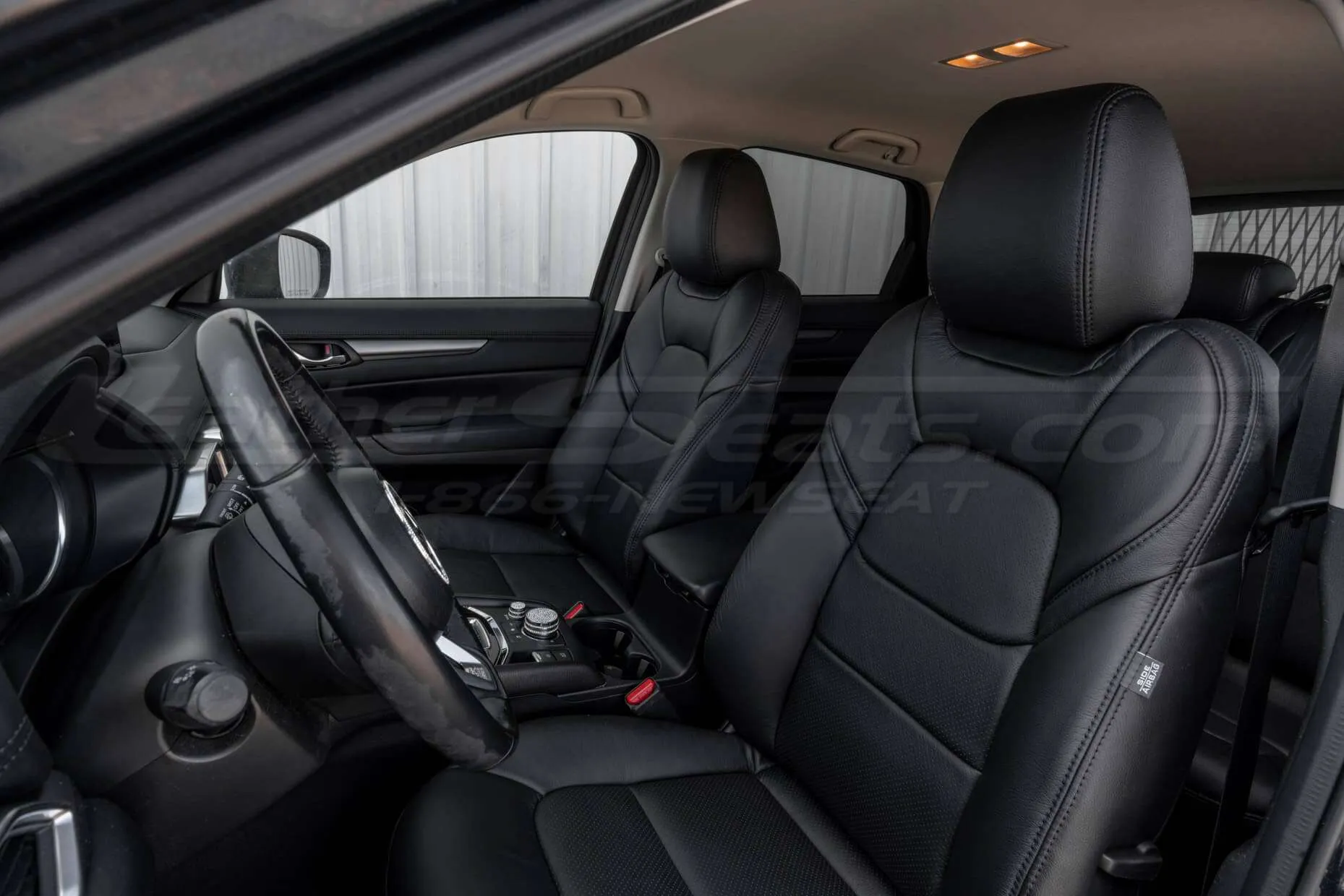 Front backrest up - Mazda CX5 black leather seats