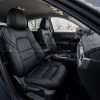 Mazda CX5 Touring with leather seats - black - Front seat from passenger side