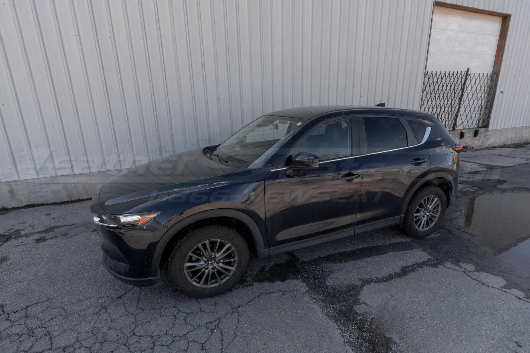 Black Mazda CX-5 Touring with leatherseats.com seats