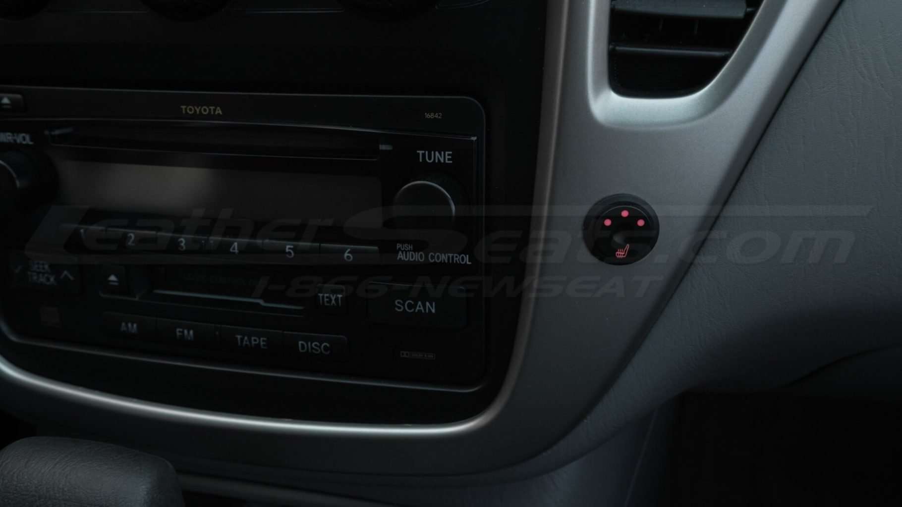 Round switch heater on passenger side