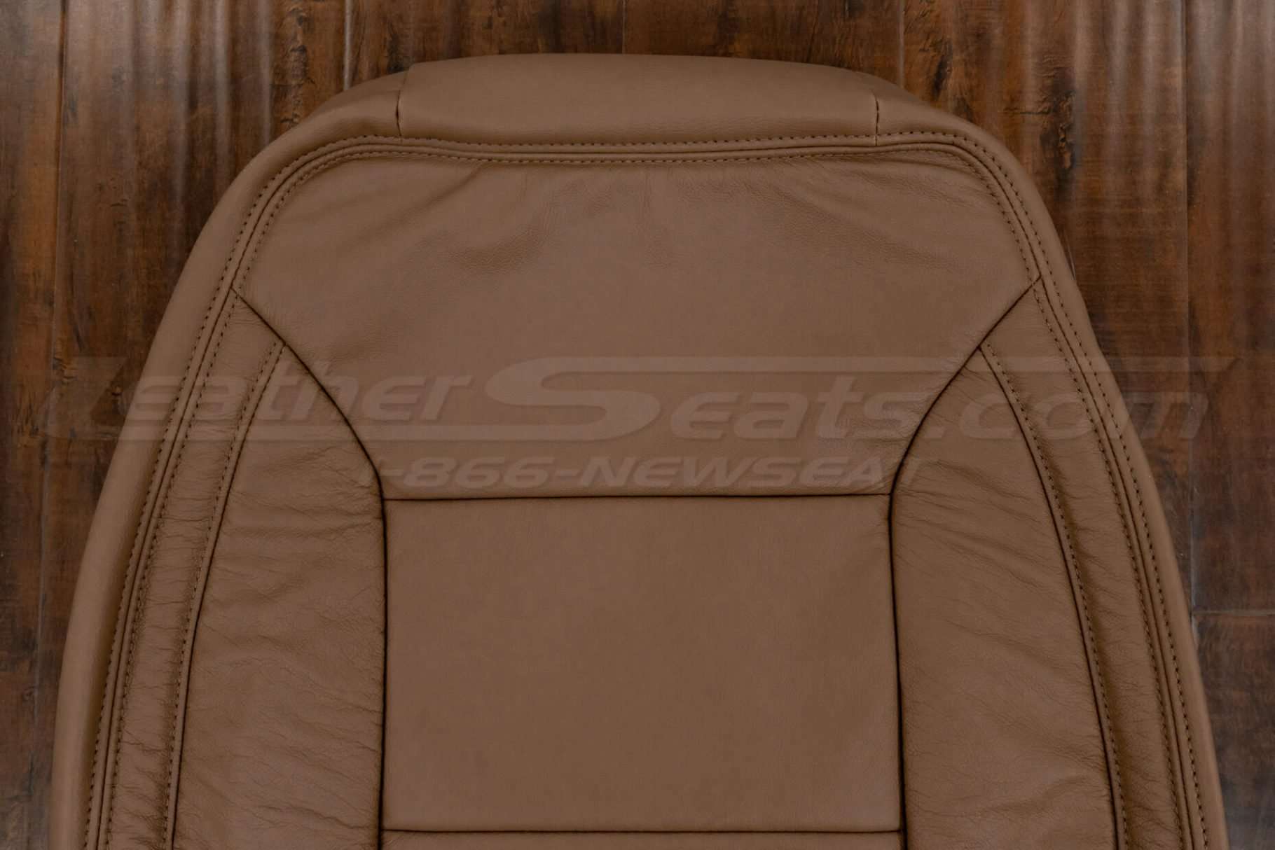 Upper section of front backrest upholstery